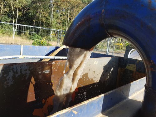 Losgetrokken vuil boorgatwand